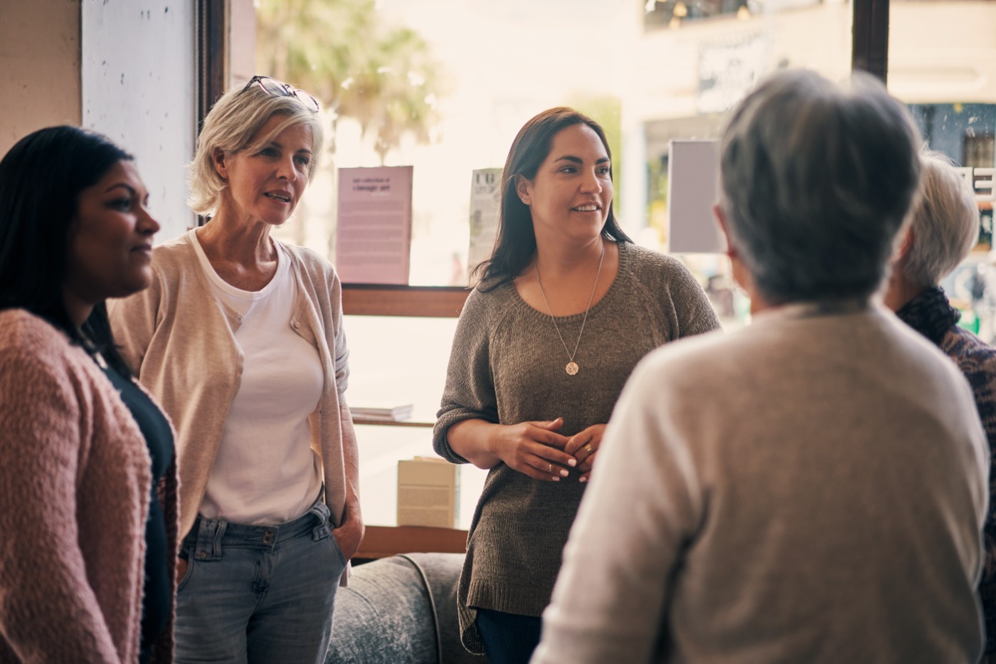 Group of women talking together at a community gathering
